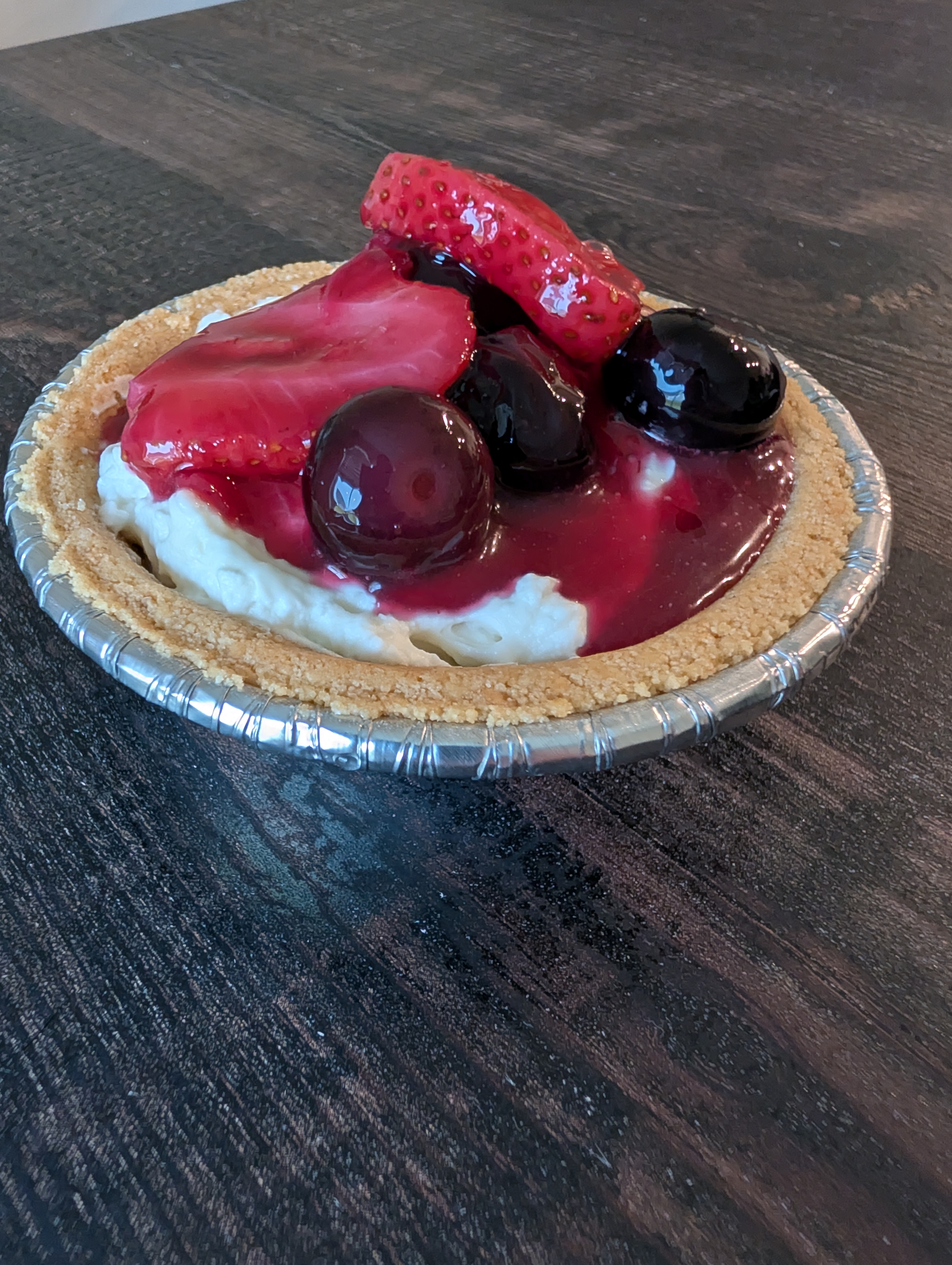 Strawberry and blueberry mini cheesecakes